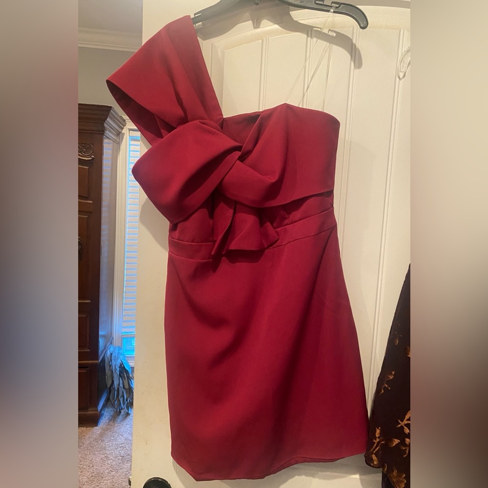 Flattering one strap cocktail dress. Never been worn!
